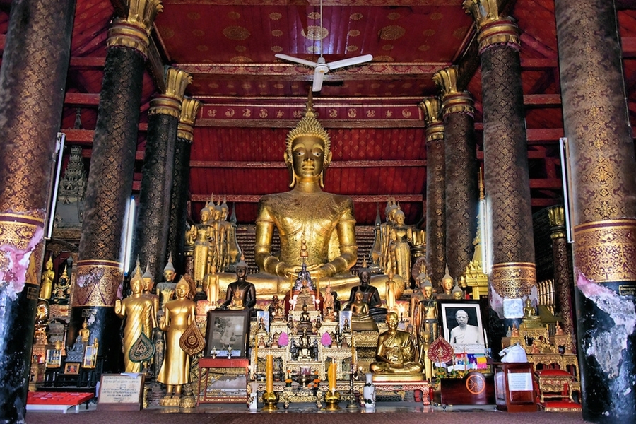 Gilded Buddha at Altar at Wat Mai in Luang Prabang